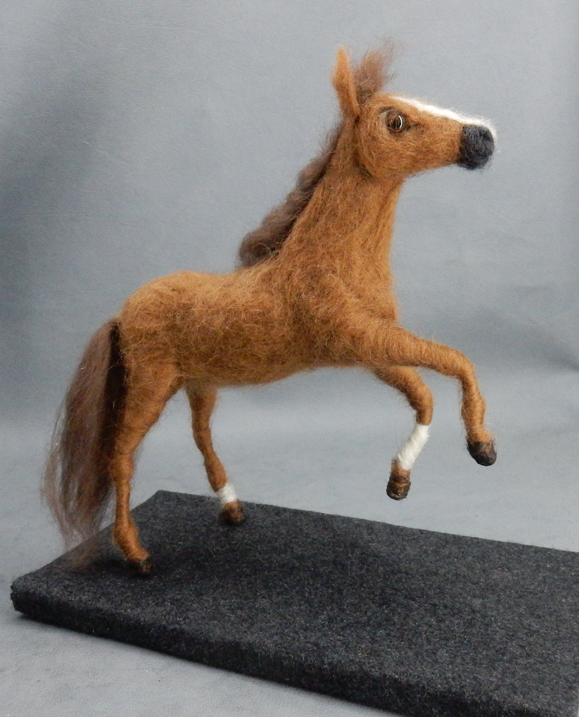 jumping horse-on-pad needle-felted horse gift