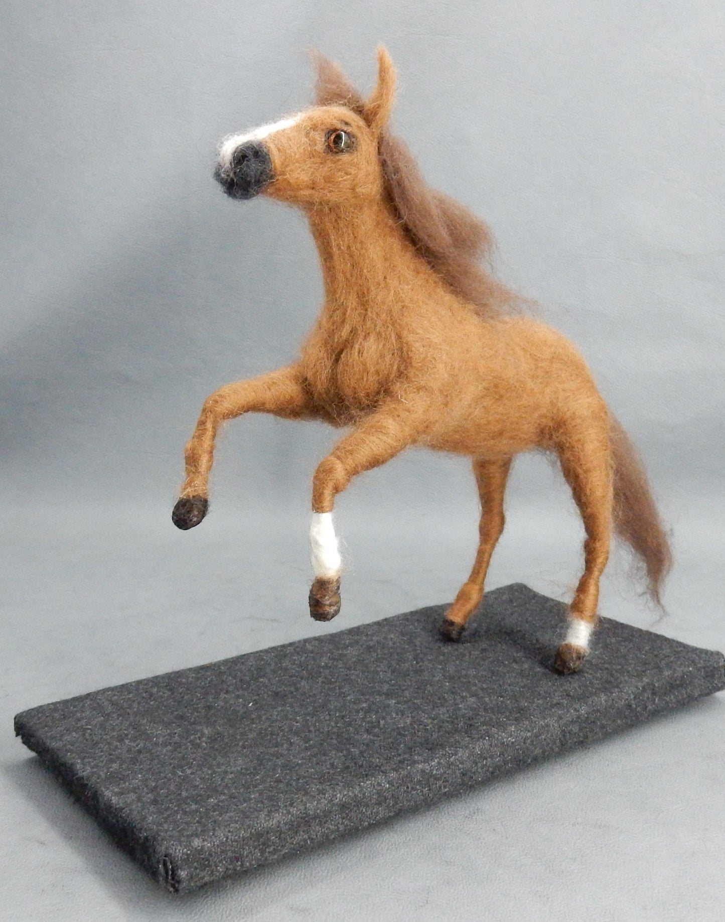 jumping horse-on-pad needle-felted horse gift